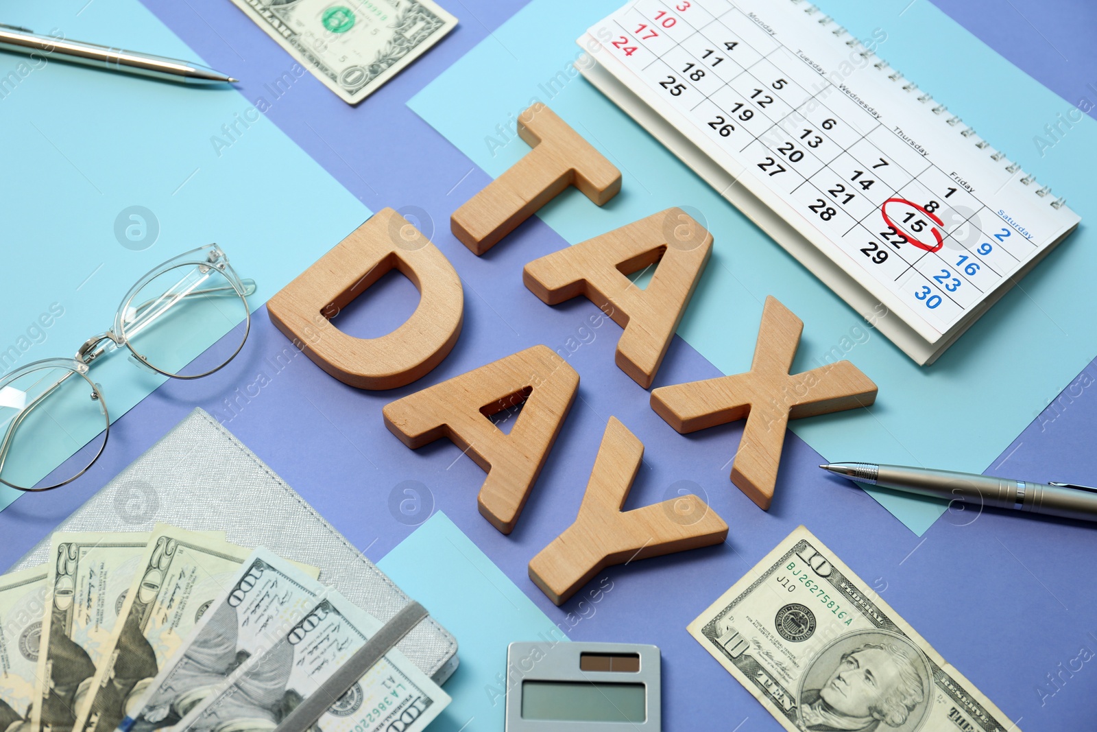 Photo of Composition with words TAX DAY and money on color background