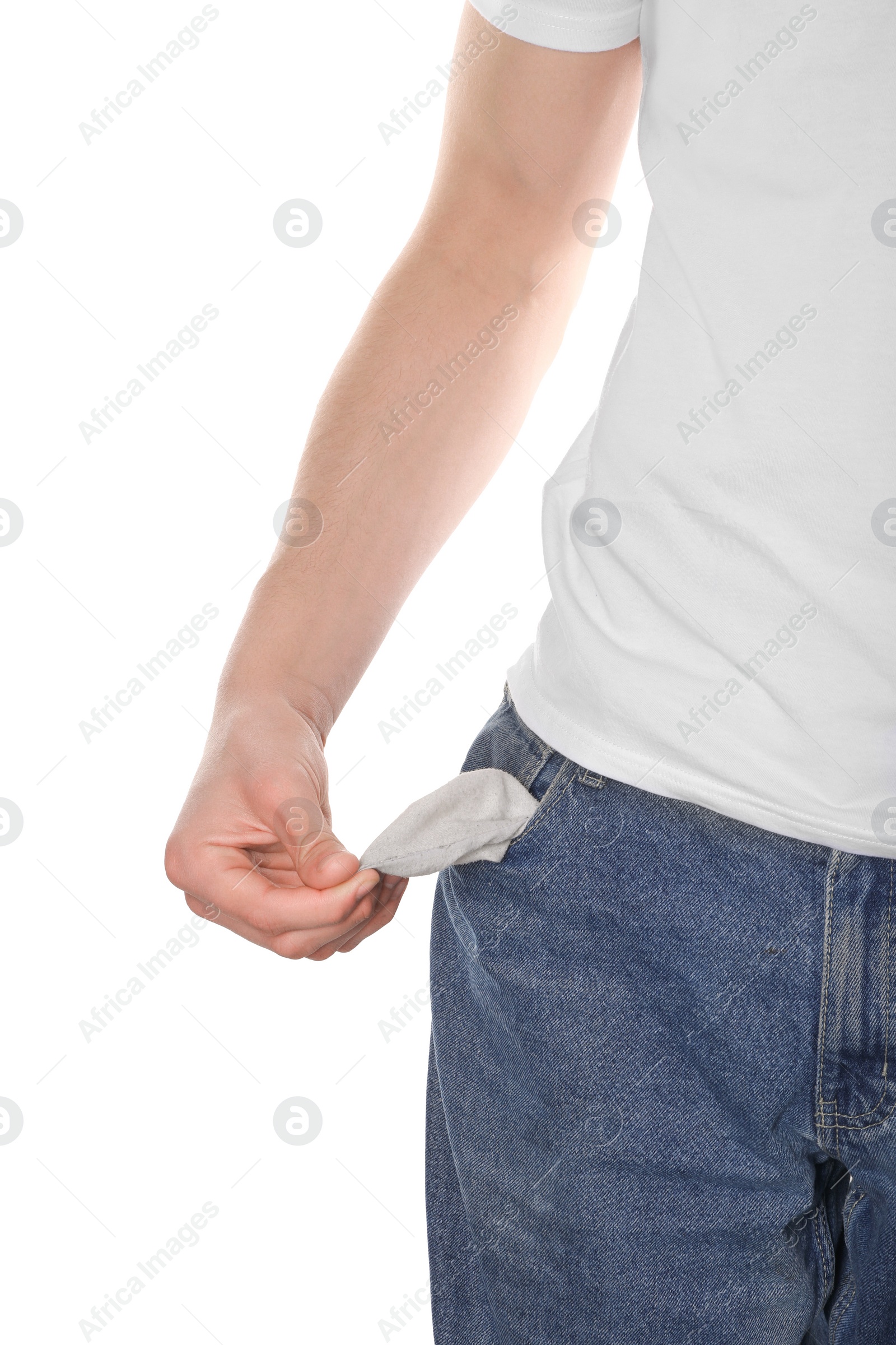 Photo of Poor man showing empty pocket on white background, closeup