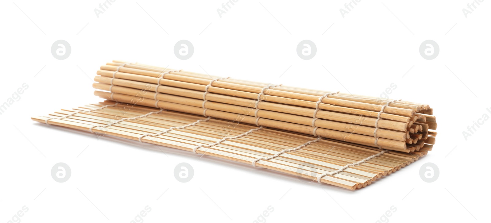 Photo of Rolled sushi mat made of bamboo on white background