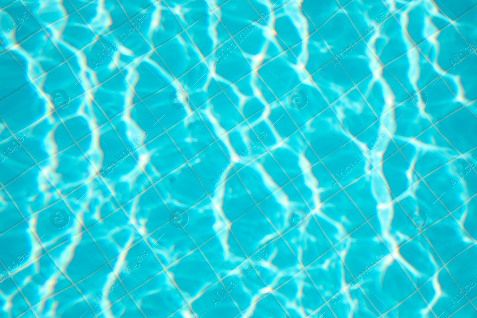 Photo of Clear water in outdoor swimming pool on sunny day