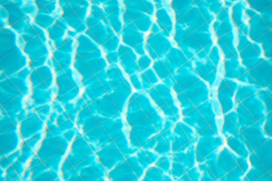 Photo of Clear water in outdoor swimming pool on sunny day