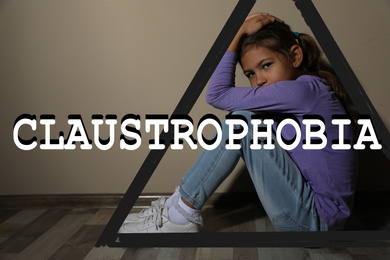 Image of Claustrophobia. Stressed little girl feeling in closed space 