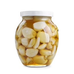 Garlic with honey in glass jar isolated on white