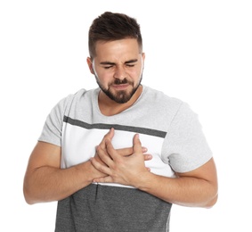 Photo of Man suffering from heart pain on white background