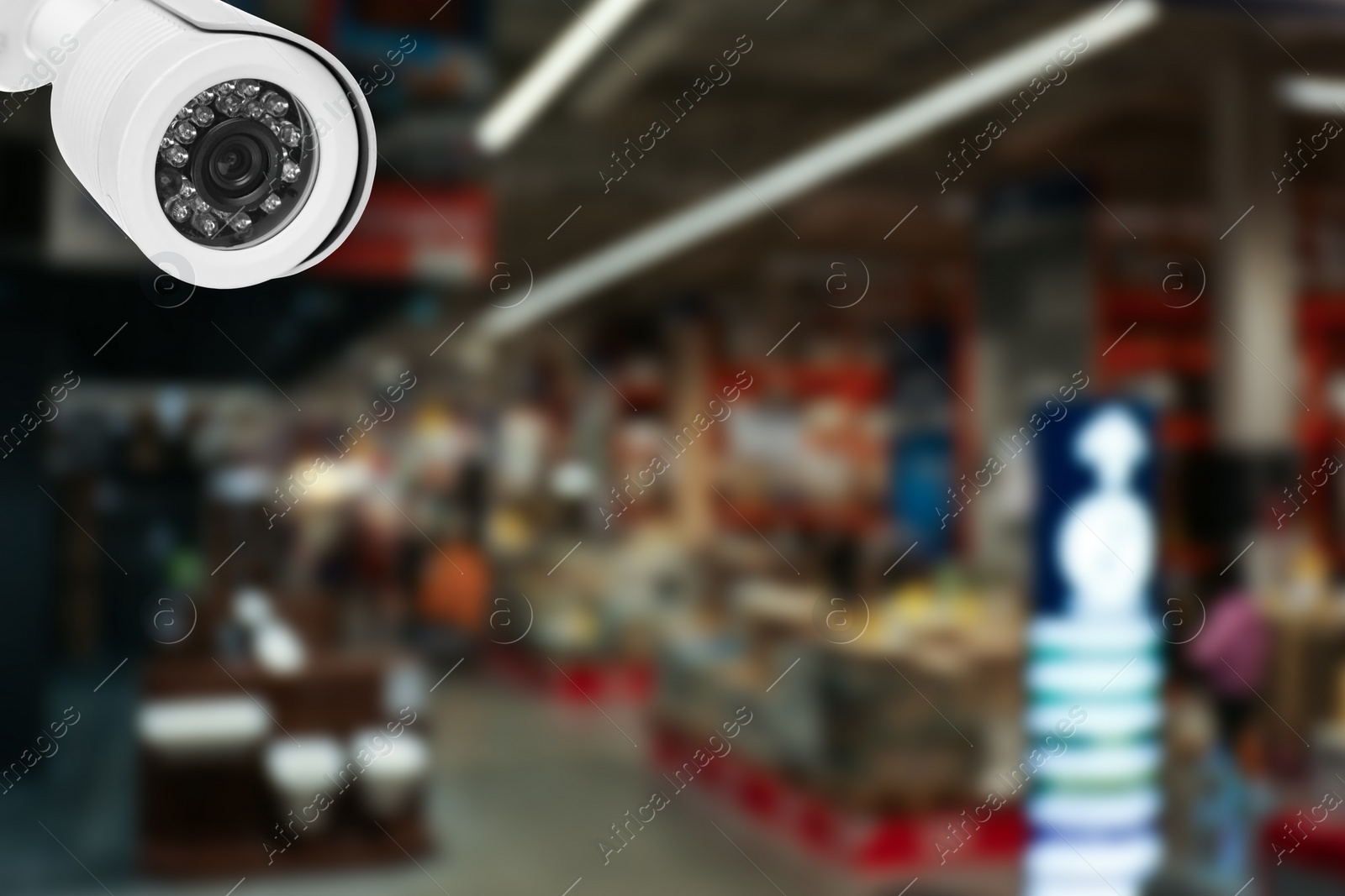 Image of Modern CCTV security camera in shopping mall. Guard equipment