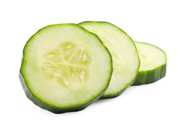 Photo of Slices of long cucumber isolated on white