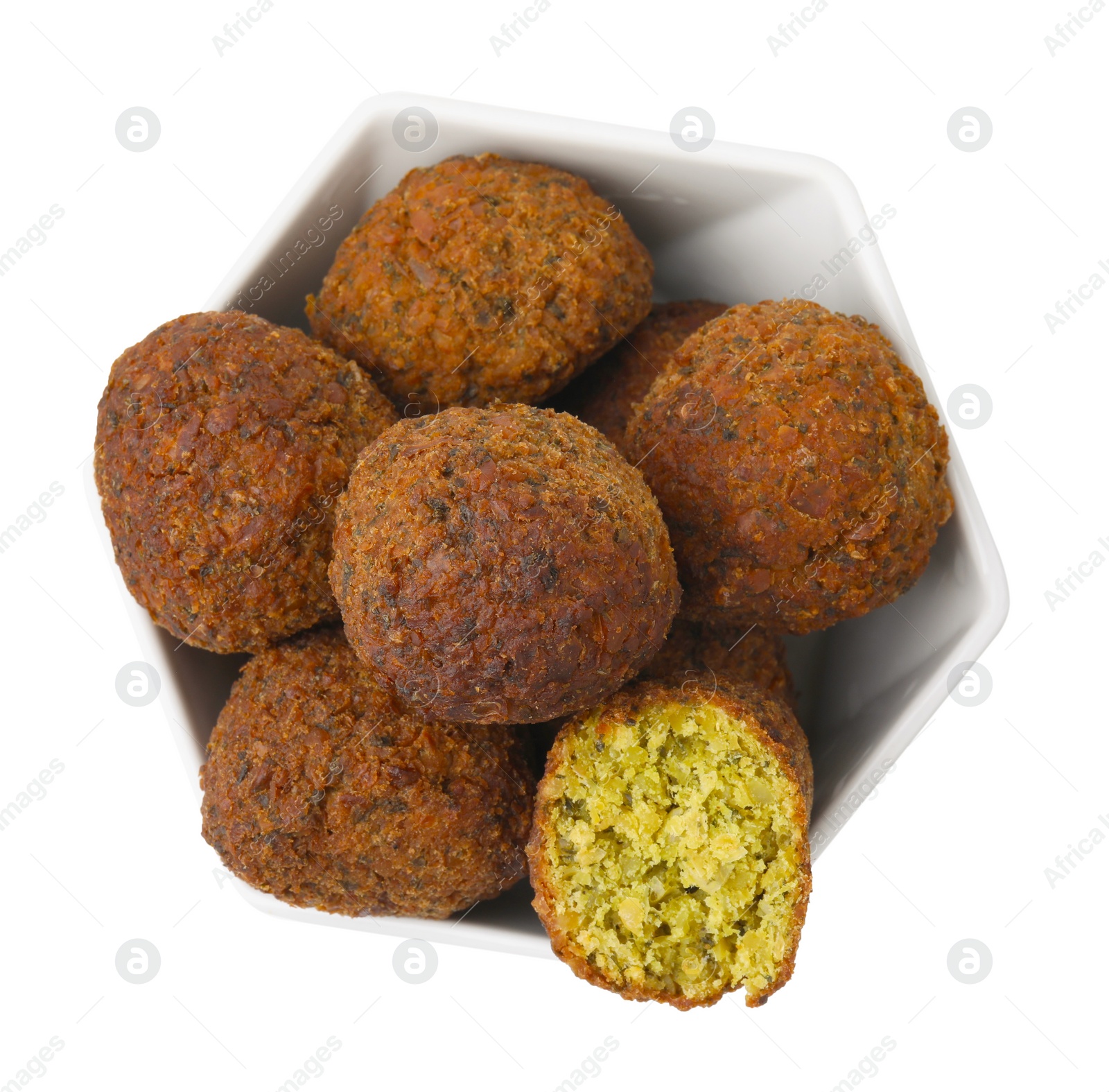 Photo of Delicious falafel balls in bowl isolated on white, top view