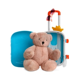 Photo of Composition with stylish little blue suitcase and teddy bear on white background