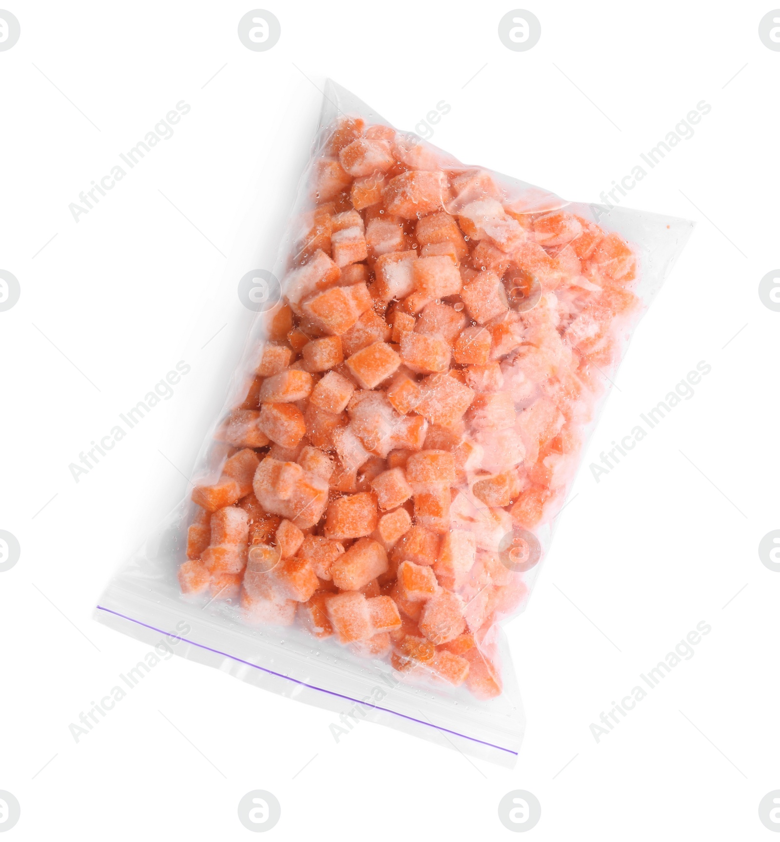 Photo of Frozen carrots in plastic bag isolated on white, top view. Vegetable preservation