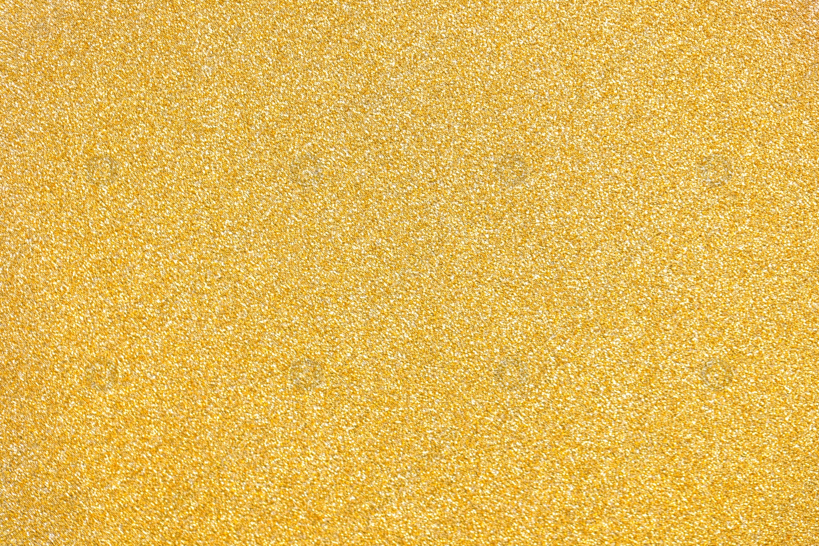 Photo of Beautiful golden shiny glitter as background, top view