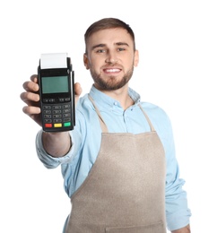 Young seller holding payment terminal isolated on white. Space for text