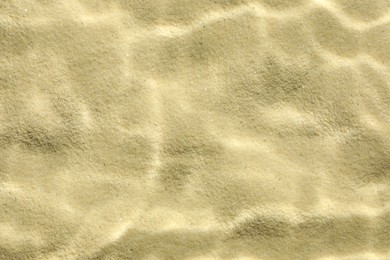 Photo of Sand under water as background, top view