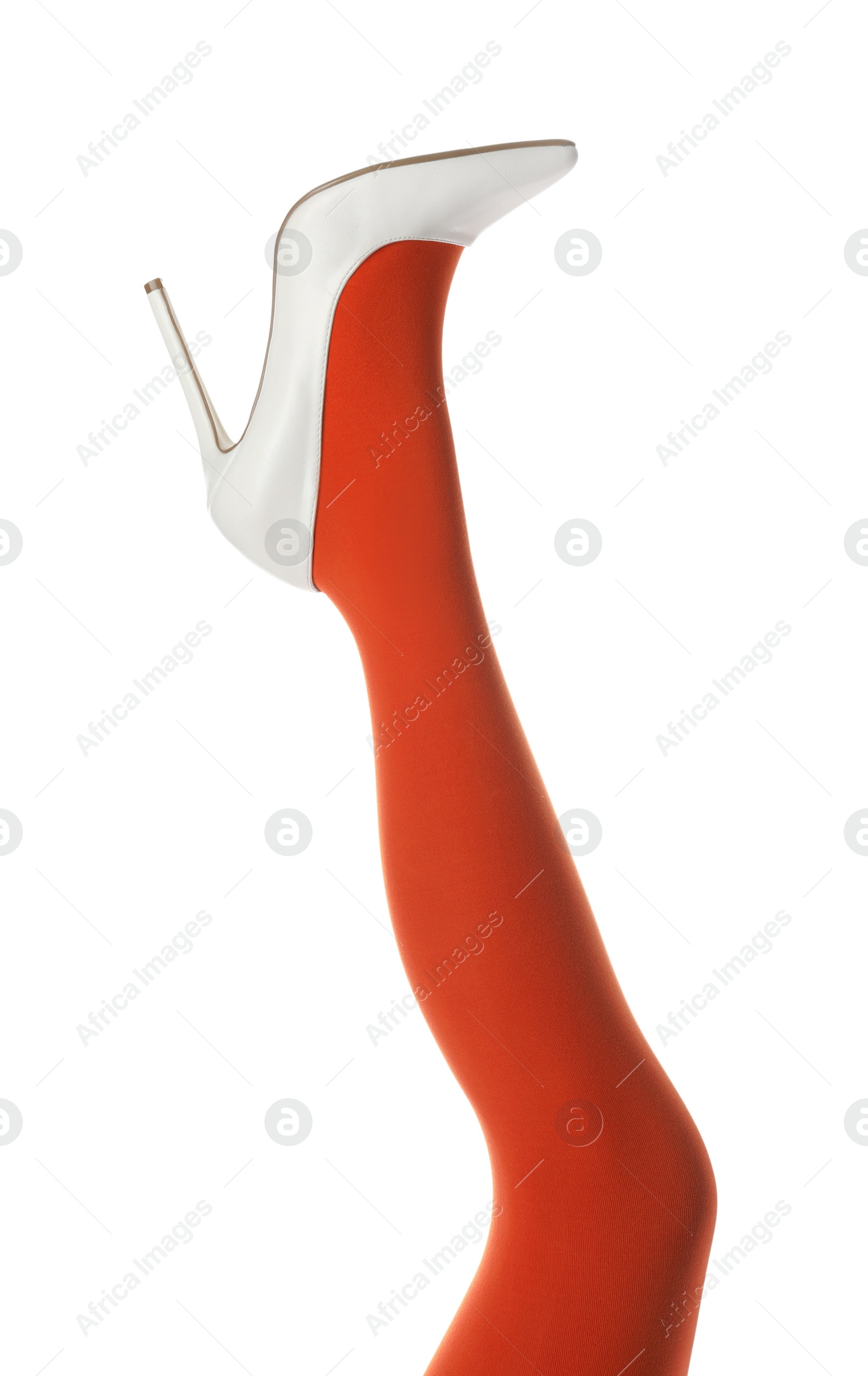Photo of Woman wearing bright tights and high heel shoe on white background, closeup
