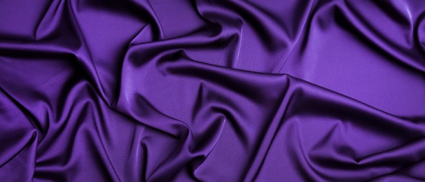 Image of Dark purple silk fabric as background, top view. Banner design