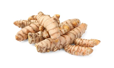 Photo of Fresh whole turmeric roots isolated on white