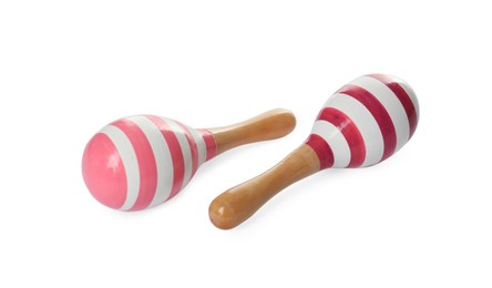 Two wooden maracas isolated on white. Children's toy