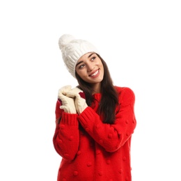 Photo of Young woman wearing warm clothes on white background. Winter season