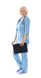 Full length portrait of female doctor in scrubs isolated on white. Medical staff