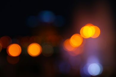 Photo of Blurred view of beautiful city at night. Bokeh effect