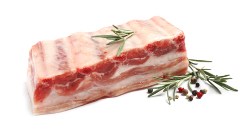 Photo of Raw ribs with rosemary and pepper on white background