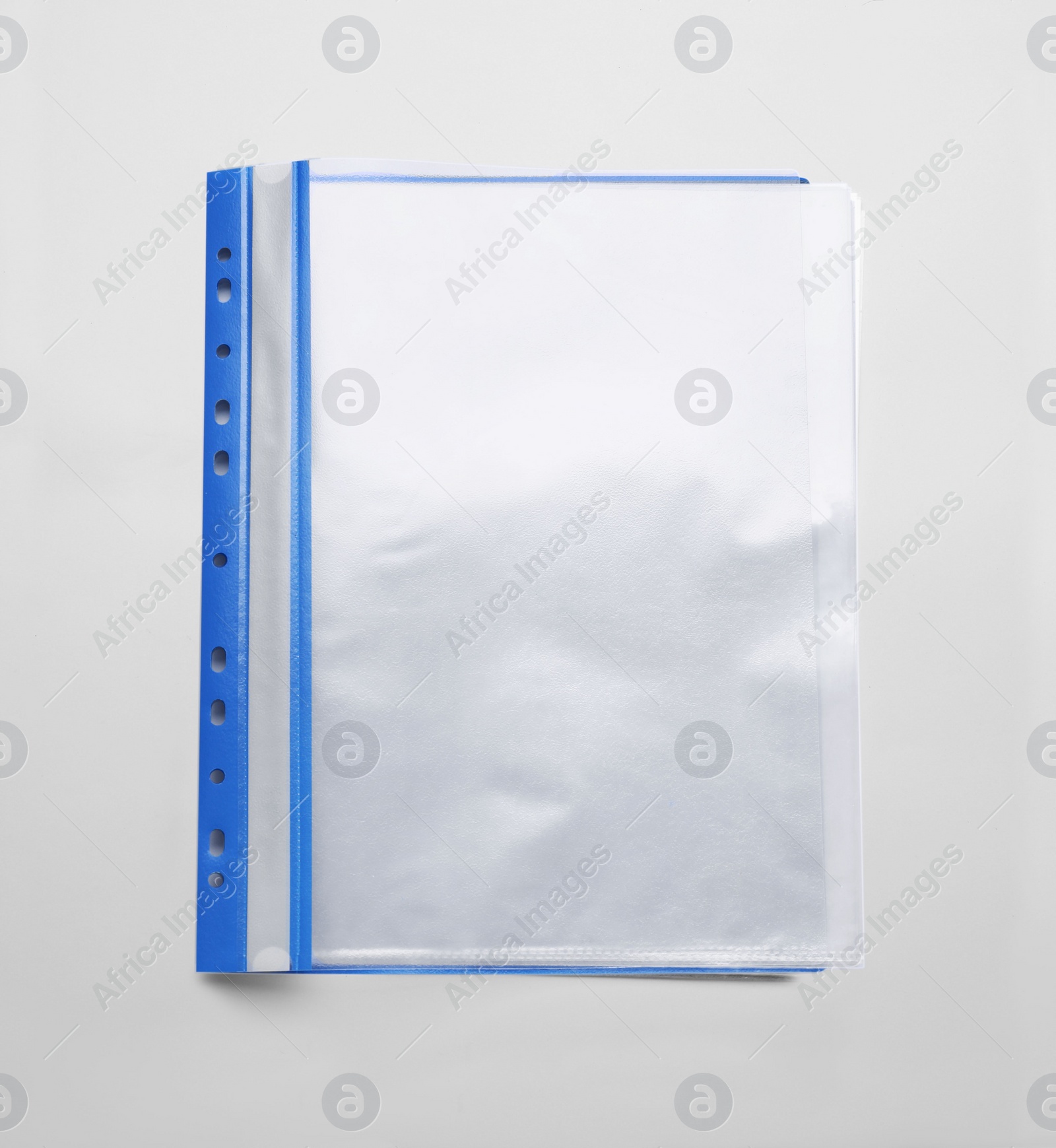 Photo of File folder with punched pockets isolated on white, top view