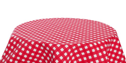 Table with checkered tablecloth isolated on white