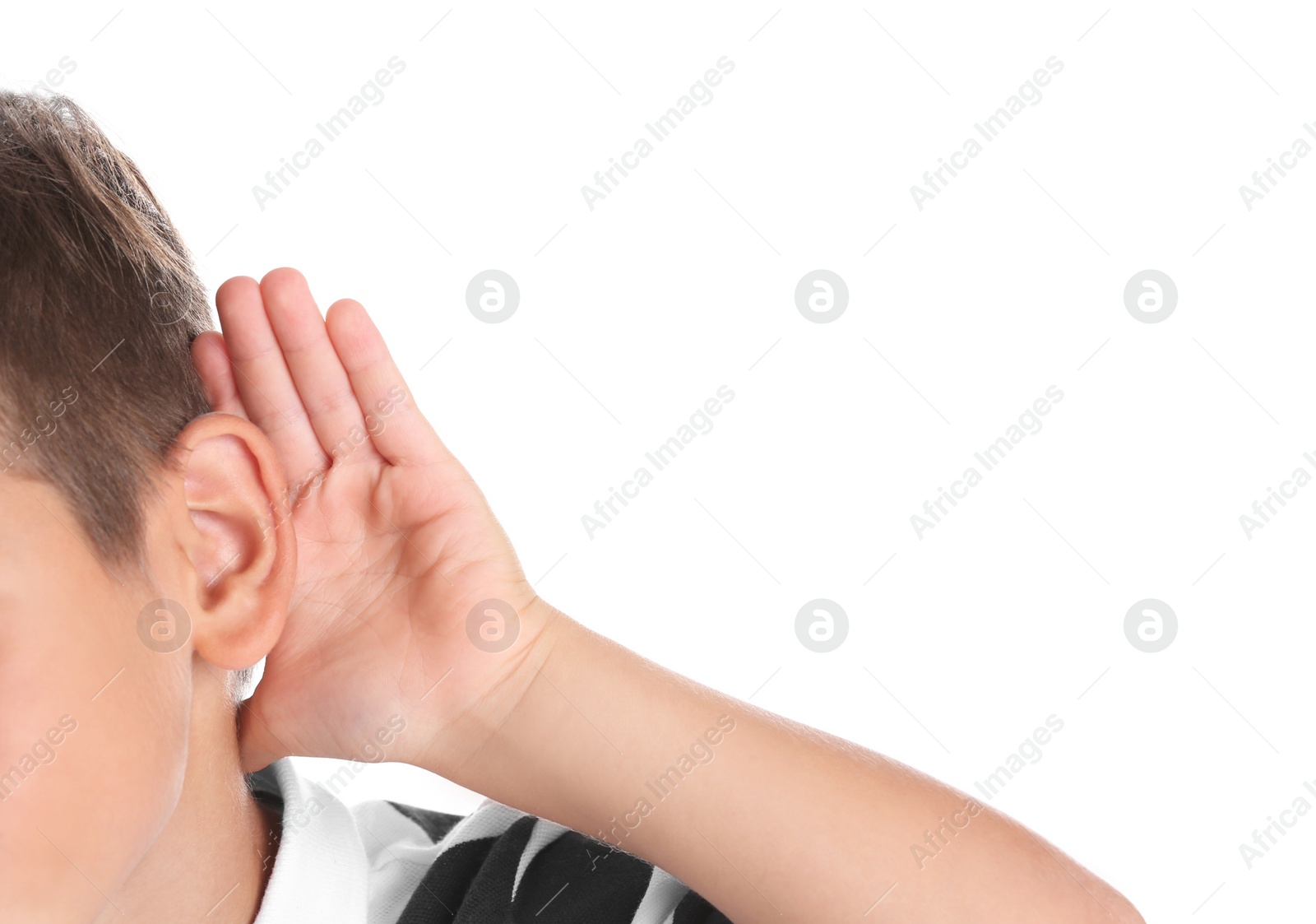 Photo of Cute little boy with hearing problem on white background, closeup