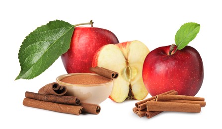Image of Aromatic cinnamon sticks, powder and red apples isolated on white