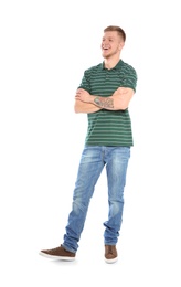 Photo of Full length portrait of handsome young man on white background