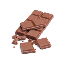 Photo of Pieces of delicious milk chocolate bar on white background