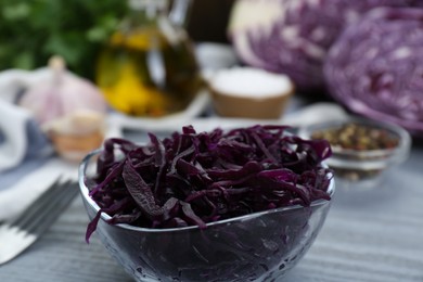 Tasty red cabbage sauerkraut on light grey wooden table