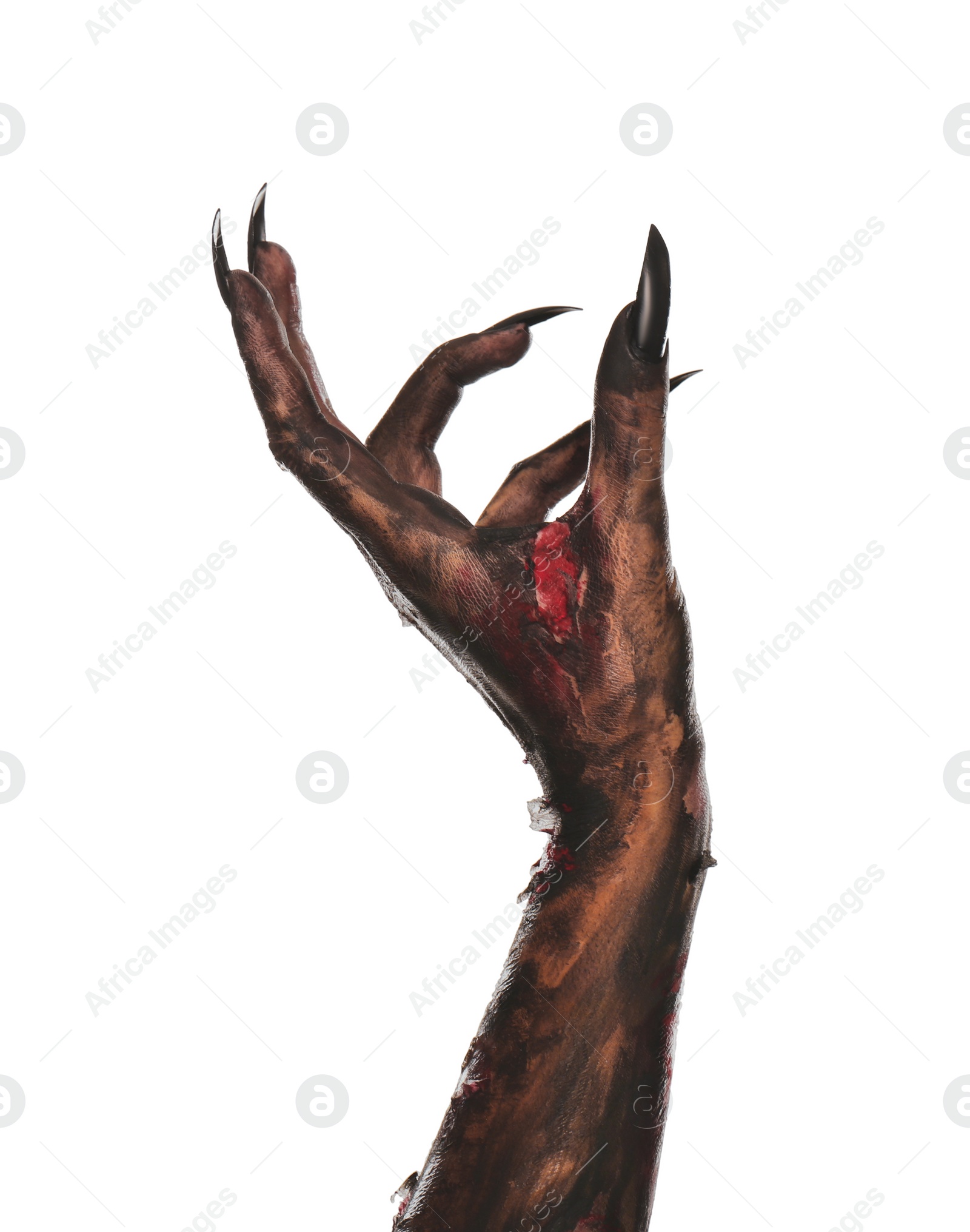 Photo of Scary monster on white background, closeup of hand. Halloween character