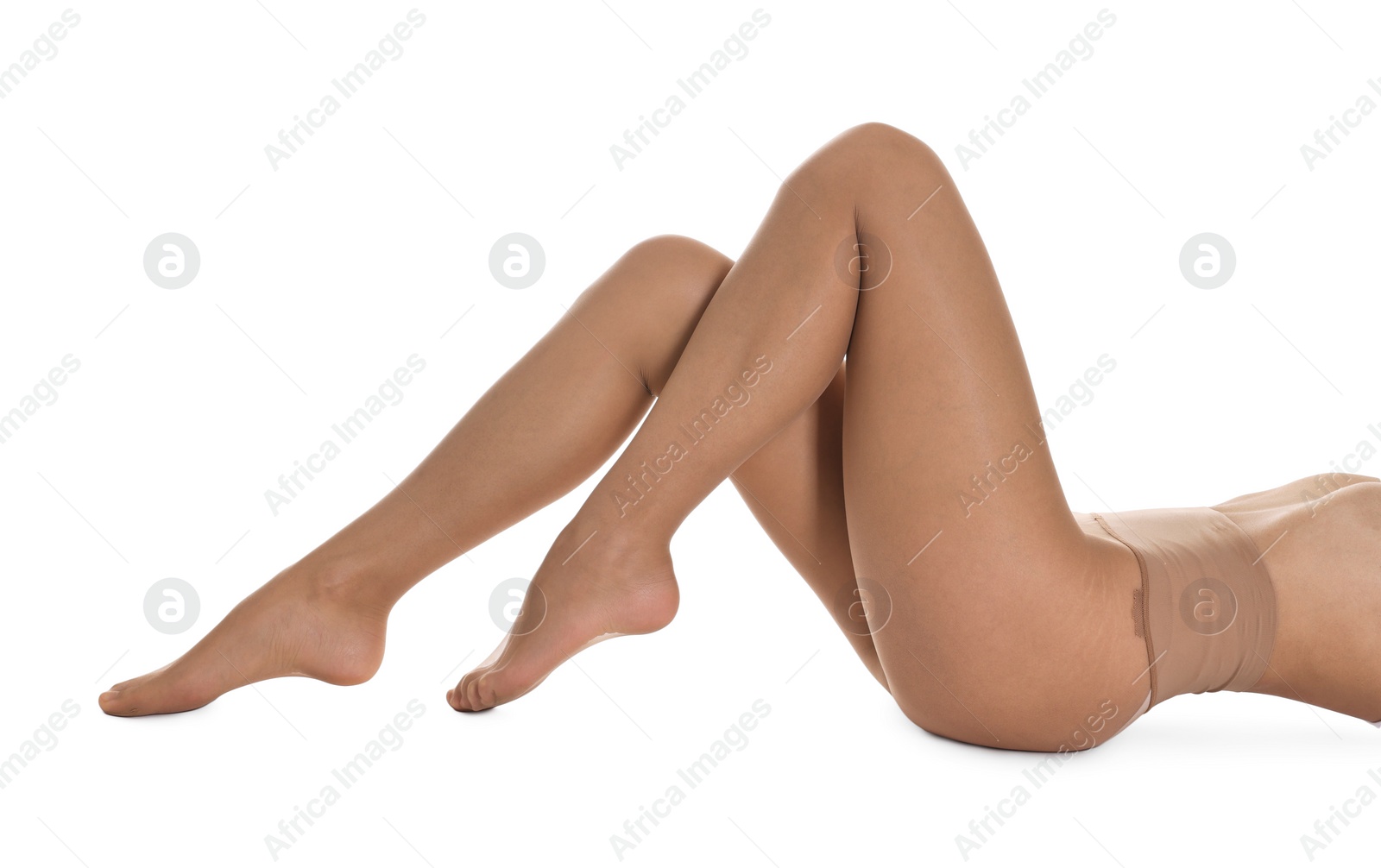 Photo of Woman with beautiful long legs wearing tights on white background, closeup