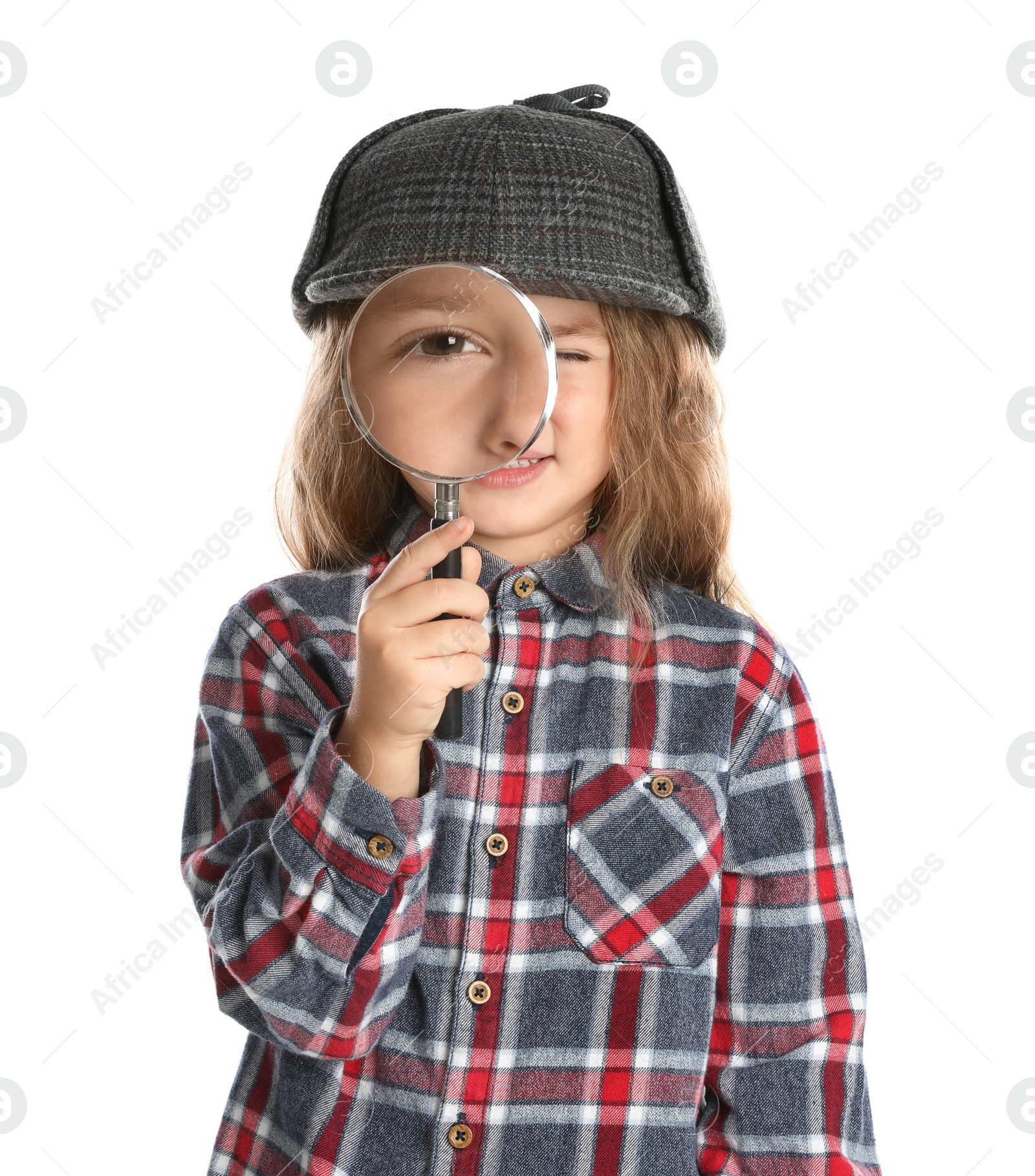 Photo of Cute little child in hat with magnifying glass playing detective on white background