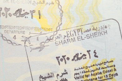 Photo of MYKOLAIV, UKRAINE - FEBRUARY 23, 2022: Passport page with Egypt visa stamps, closeup