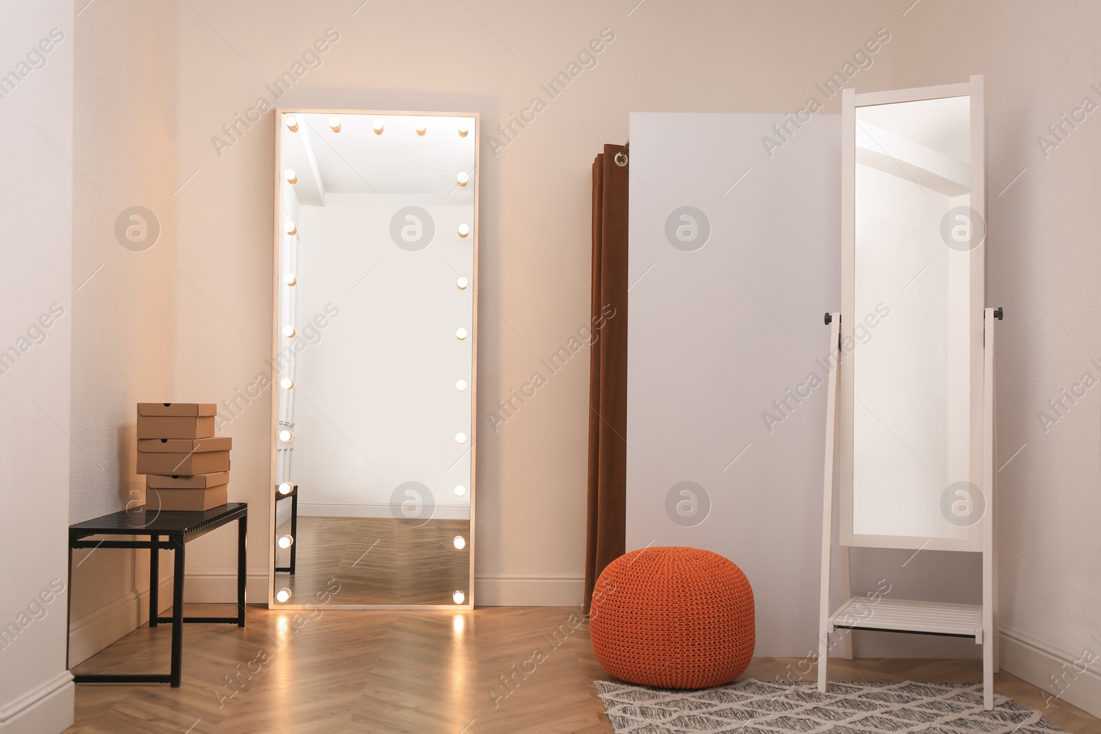 Photo of Fashion store interior with dressing room. Modern design