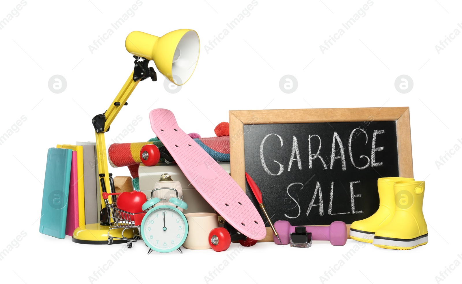 Photo of Blackboard with sign Garage Sale and many different stuff isolated on white