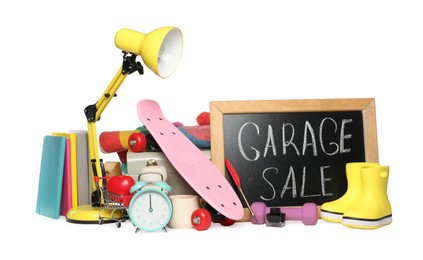 Blackboard with sign Garage Sale and many different stuff isolated on white
