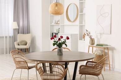 Stylish dining room interior with comfortable furniture