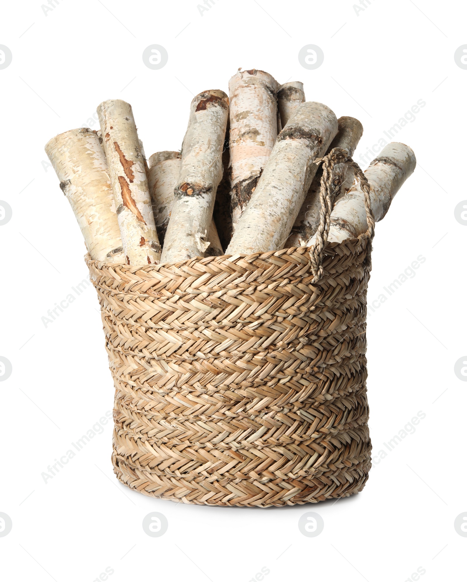 Photo of Wicker basket with cut firewood isolated on white