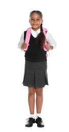Happy African-American girl in school uniform on white background