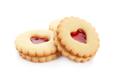 Photo of Traditional Christmas Linzer cookies with sweet jam on white background