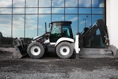 Photo of Modern skid loader on construction site outdoors