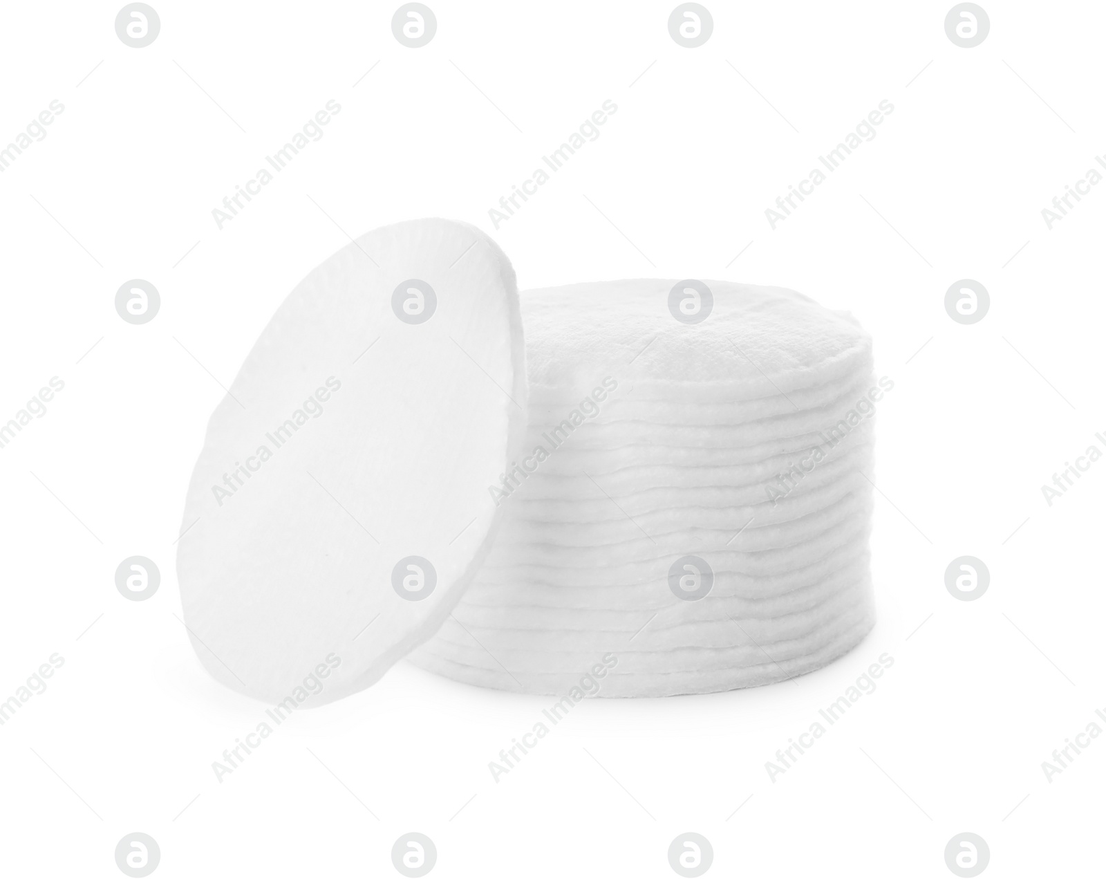 Photo of Pile of cotton pads on white background