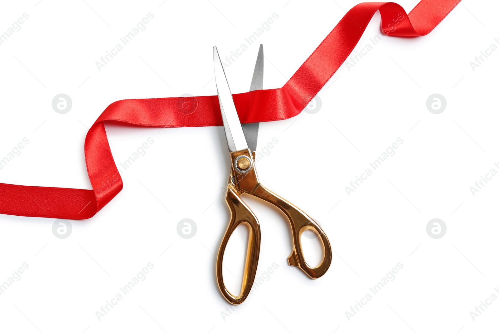 Photo of Ribbon and scissors on white background, top view. Ceremonial red tape cutting