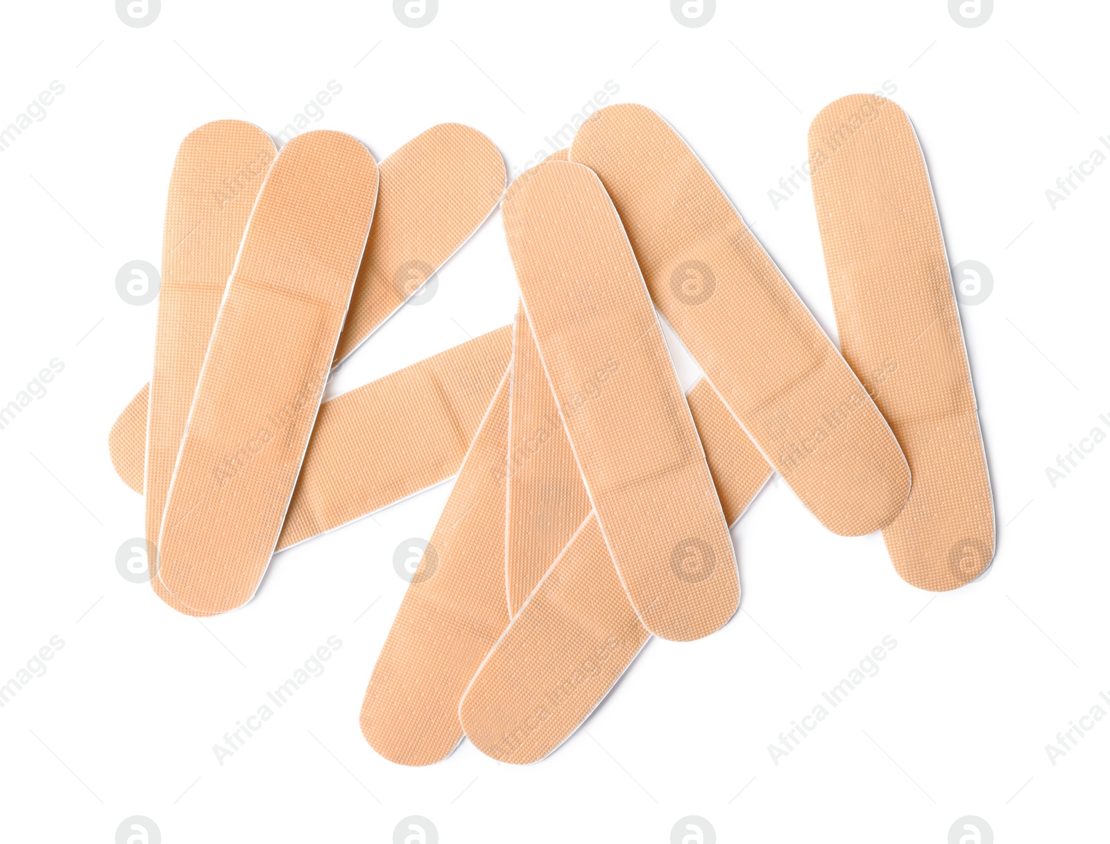 Medical sticking plasters isolated on white. First aid item Photo of Medical sticking plasters isolated on white. First aid item