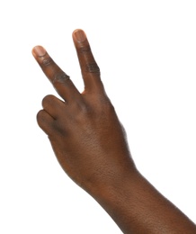 Photo of African-American man showing number TWO on white background, closeup