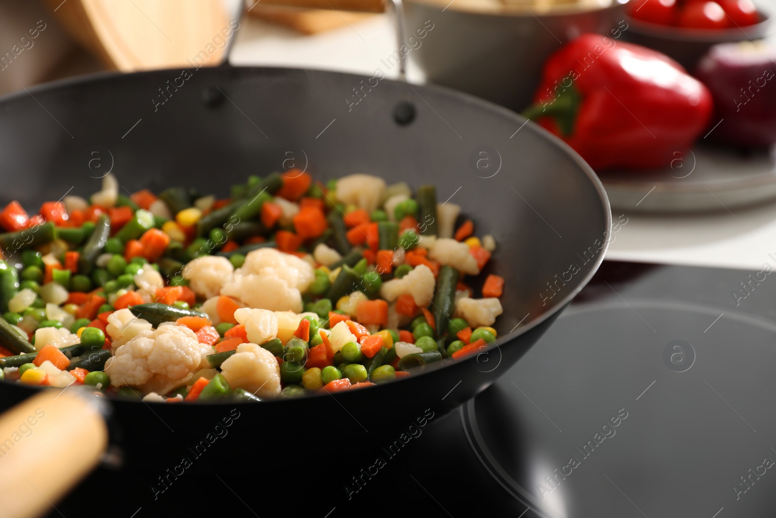 Photo of Frying pan with mix of fresh vegetables, closeup