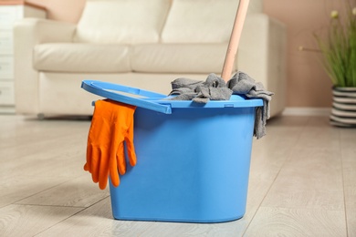 Cleaning supplies on floor in living room