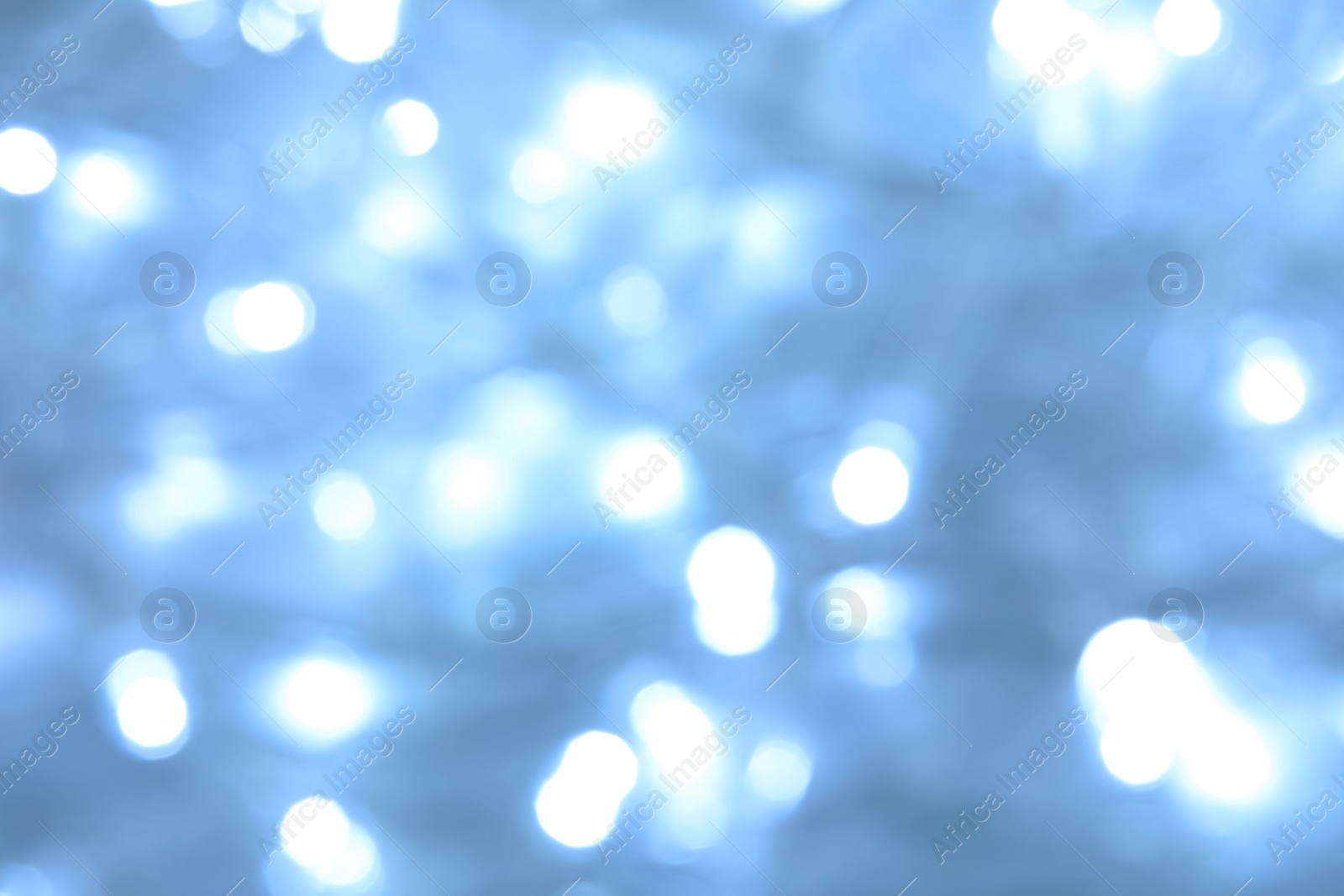 Photo of Blurred view of beautiful Christmas lights. Festive background